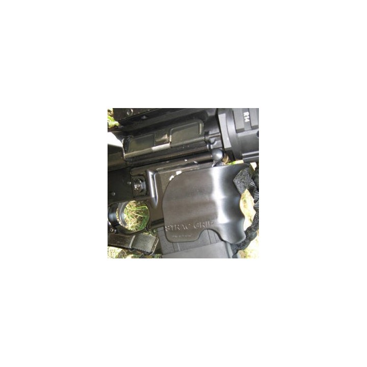 Polymer grip to the magazine well Black